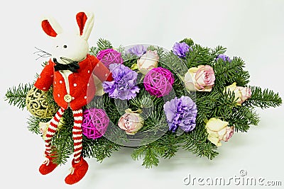 Christmas mouse on the background of the Christmas bouquet Stock Photo
