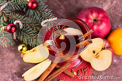 Christmas mulled wine with apples and citrus fruits and spices. View from above. Stock Photo