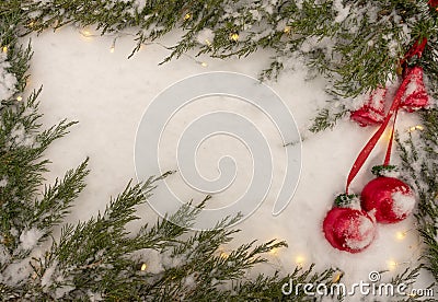 Christmas and New Year background. Snowflake, Christmas tree and ball on a white snow background. Stock Photo