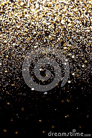 Christmas New Year Black and Gold Glitter background. Holiday abstract texture fabric Stock Photo