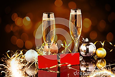 Christmas and New Year celebration with champagne. New Year holiday decorated table. Two Champagne Glasses Stock Photo