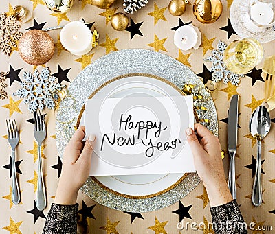 Happy New Year card and festive table settings Stock Photo