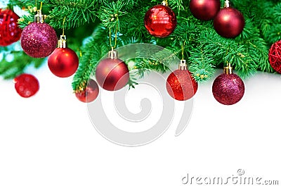 Christmas or New Year festive border, winter holidays decorative frame, red shiny balls decorations hanging on green pine branches Stock Photo