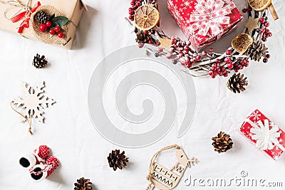 Christmas and new year flat lay decor with wreath and gift box on white backround Stock Photo