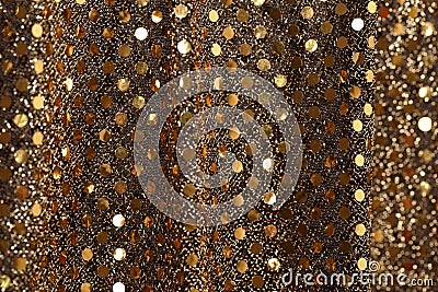 Christmas New Year Gold Glitter background. Holiday abstract texture fabric Stock Photo