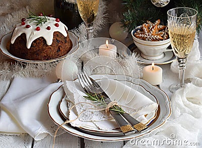 Christmas And New Year Holiday Table Setting. Celebration. Place setting for Xmas Dinner. Holiday Decorations. Decor. Plate, Tange Stock Photo