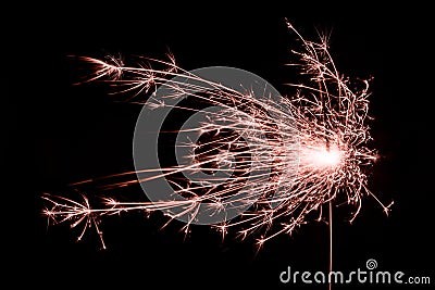 Christmas/New Year sparkling orange bengal light Stock Photo