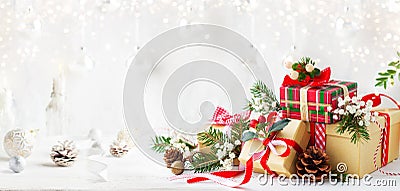 Christmas or New Year still life with Gift Boxes and Christmas Decorationson a white wooden table. Festive concept Stock Photo