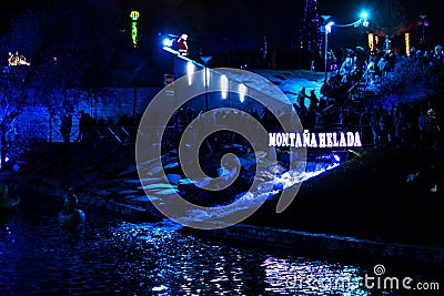 Christmas park in Torrejon de Ardoz, Madrid, Spain. frozen mountain in text in spanish language. Editorial Stock Photo