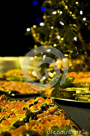 Christmas party food and tree Stock Photo