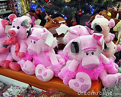 Christmas pigs under the tree Stock Photo