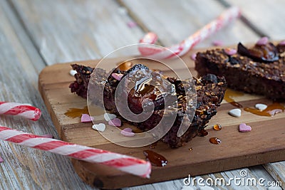 Christmas plum cake with candy canes decoration Stock Photo