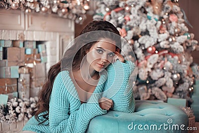 Christmas Portrait of Beautiful brunette girl wears in turquoise Stock Photo