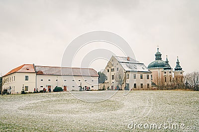 Christmas Post Office Christkindl Postamt and Cathloic Church in Stock Photo