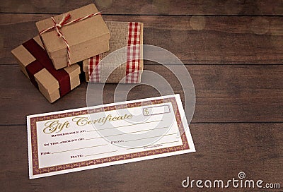 Christmas Presents and Blank Gift Certificate Stock Photo