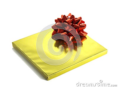 Christmas presents in shiny foil wrappers Stock Photo