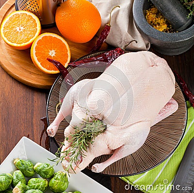 Christmas raw duck served on a kitchen table Stock Photo