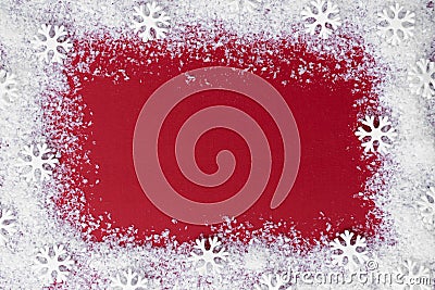 Christmas red background with snow and snowflakes frame. Winter, festive holiday mock up, copy space. Abstract red christams Stock Photo