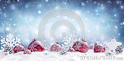 Christmas - Red Baubles Decorated And Snowflakes Stock Photo