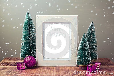Christmas retro poster mock up with pine trees and pink decorations Stock Photo