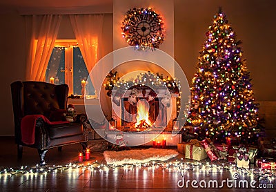 Beautiful decorated living room with a christmas tree and a fire place Stock Photo