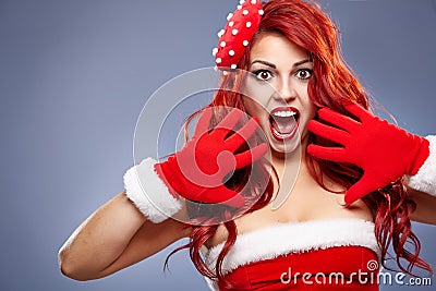 Christmas Santa hat redhair woman portrait . Stock Photo