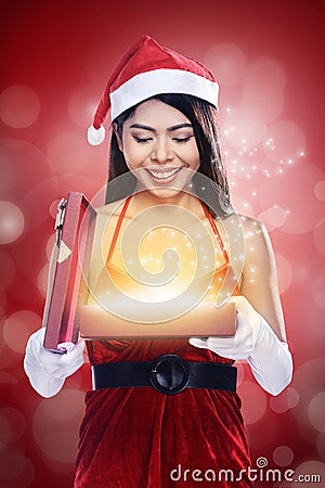 Christmas Santa Woman Opening Gift Box Stock Photo