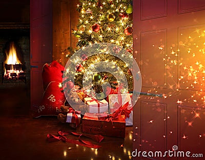 Christmas scene with tree and fire in background Stock Photo