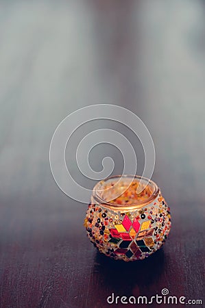 Christmas season decoration with simple Scandinavian style including handmade decorative candles from Greece on a wooden table. Stock Photo