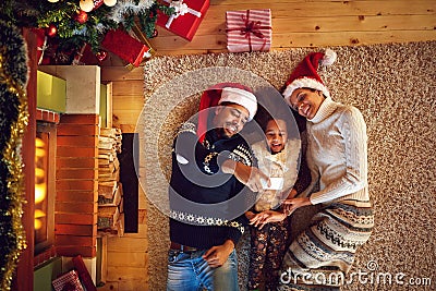 Christmas selfie of young happy family Stock Photo