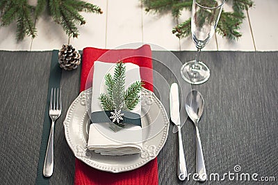 Christmas serving table. Traditional festive decoration background top view. Cutlery utensils beautiful plates decorative elements Stock Photo
