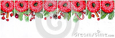 Christmas set composition. Sweet donuts, green fir twig, cone, baubles and red holly berries on white stucco plaster texture. Stock Photo