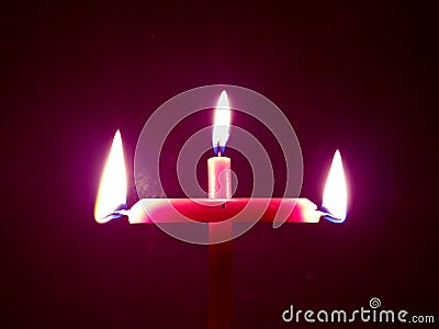Christmas shaped candles flame Stock Photo