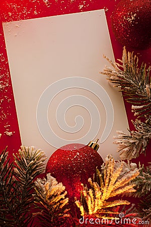 Christmas sheet of paper and baubles Stock Photo