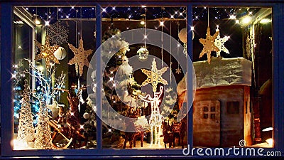 Christmas Shop Window with Festive Decorations Stock Photo