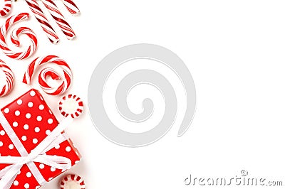 Christmas side border of red and white gifts and candies Stock Photo
