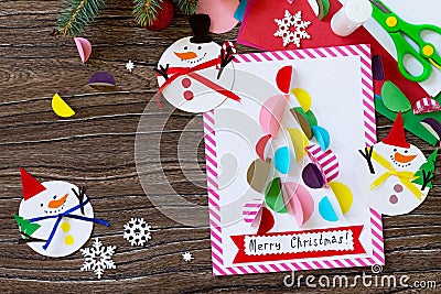 Christmas snowman merry gift and Christmas tree card. Handmade. Stock Photo