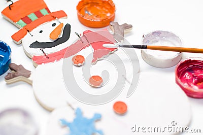 Christmas snowman painted by child with color pain Stock Photo