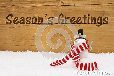 Christmas Snowman with text Season`s Greetings Stock Photo