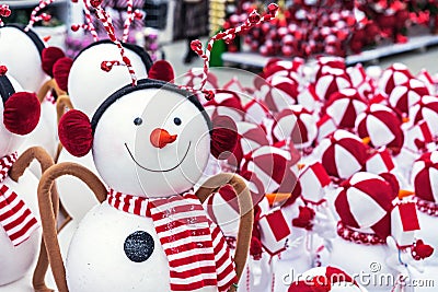 Christmas snowman toy with a striped red scarf Stock Photo