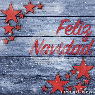 Christmas square greeting card with Spanish text on wood table Stock Photo