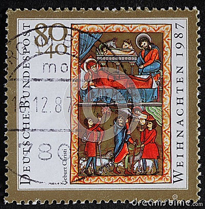 Christmas stamp printed in the Germany shows birth of Jesus Christ, adoration of the Shepherds Editorial Stock Photo