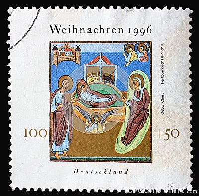 A Christmas stamp printed in Germany shows Birth of Jesus Christ, Illustration from Henry II`s Book of Pericopes Editorial Stock Photo