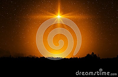 Christmas star. Background of the beautiful nite golden starry sky and bright star. Stock Photo