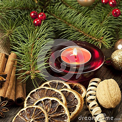 Christmas still life with spices and candle Stock Photo