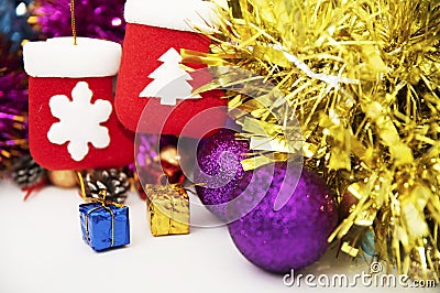 Two christmas stockings hanging among toys Stock Photo