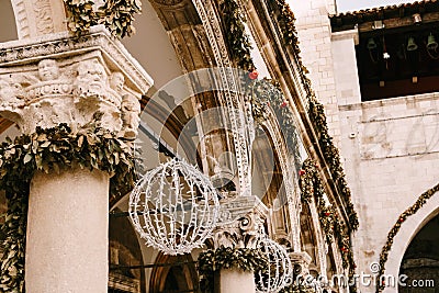 Christmas street decorations, walls of houses in the old town of Dubrovnik, Croatia. Stock Photo
