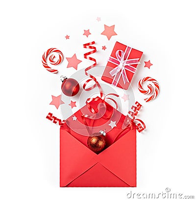 Christmas Surprise gift pop out of red envelope Stock Photo