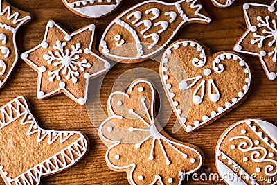 Christmas sweet cakes. Christmas homemade gingerbread cookies on wooden table Stock Photo