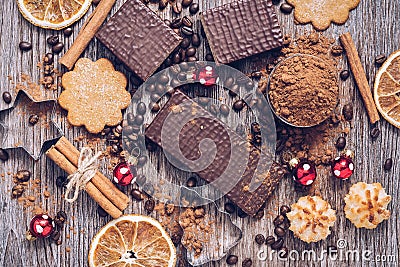 Christmas sweets with Christmas balls. Wafers in chocolate with biscuits and cocoa powder. Stock Photo